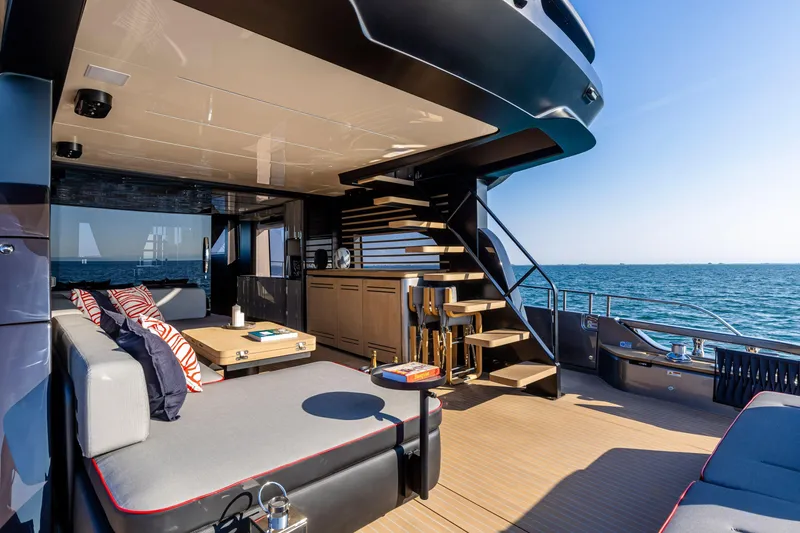 Slide: The Image of Luxurious 2026 Cranchi Sessantasette 67 Corsa yacht interior with modern seating and ocean view. - 4