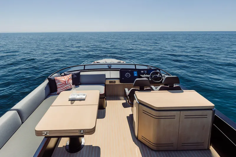 Slide: The Image of Luxurious 2026 Cranchi Sessantasette 67 Corsa yacht interior with ocean view. - 46