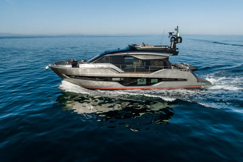 Slide: The Image of 2026 Cranchi Sessantasette 67 Corsa yacht cruising on open water. - 5