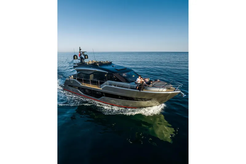 Slide: The Image of 2026 Cranchi Sessantasette 67 Corsa luxury yacht cruising on open sea. - 7