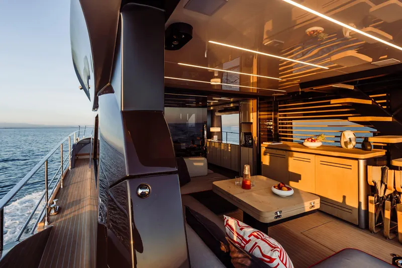 Slide: The Image of Luxurious 2026 Cranchi Sessantasette 67 Corsa yacht interior with modern design and ocean view. - 9