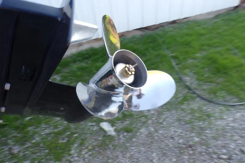Slide: The Image of Shiny boat propeller on Xpress X18DB, 2026 model, displayed outdoors. - 13