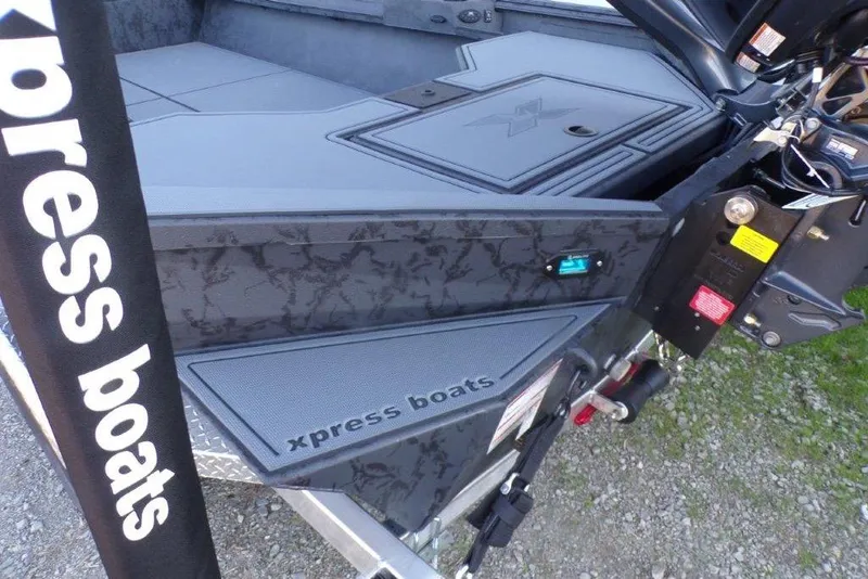 Slide: The Image of 2026 Xpress X18DB boat interior with branded detailing and modern design. - 5