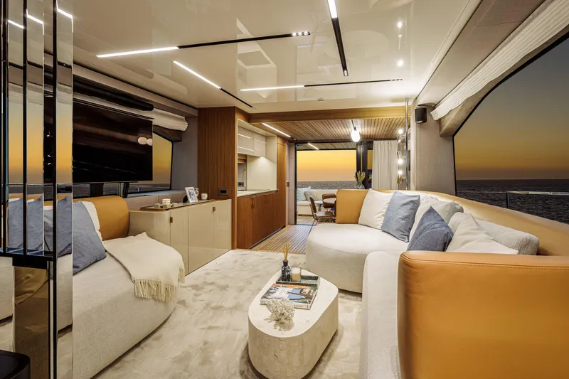 Slide: The Image of Luxurious interior of 2026 Cranchi Sessantadue 62 yacht at sunset, featuring elegant seating and decor. - 25