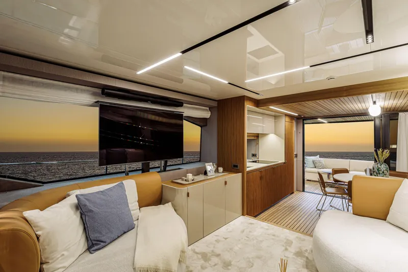 Slide: The Image of Luxurious interior of 2026 Cranchi Sessantadue 62 yacht with ocean view at sunset. - 26