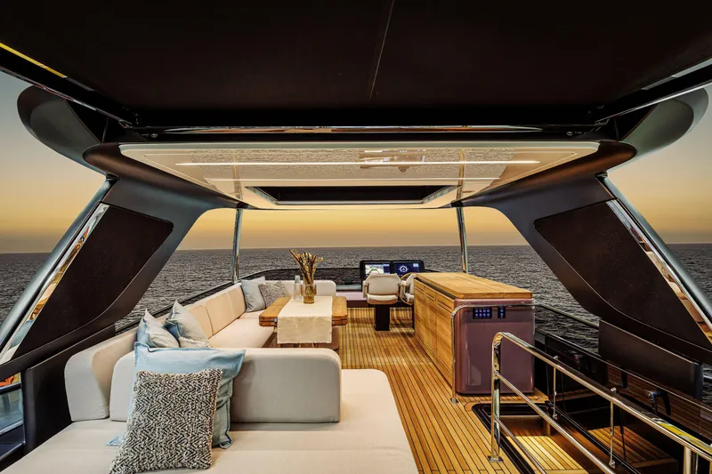 Slide: The Image of Luxurious 2026 Cranchi Sessantadue 62 yacht interior with elegant seating and ocean view. - 27