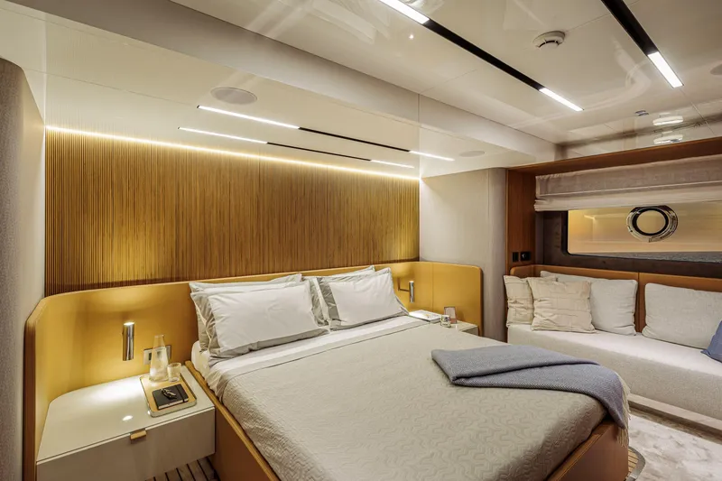 Slide: The Image of Luxurious bedroom interior of 2026 Cranchi Sessantadue 62 yacht with modern design and cozy ambiance. - 29
