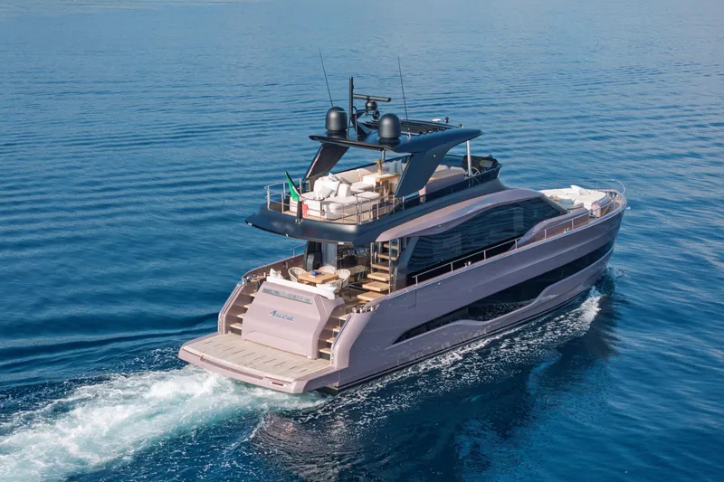 Slide: The Image of 2026 Cranchi Sessantadue 62 yacht cruising on open water, showcasing luxury design. - 3