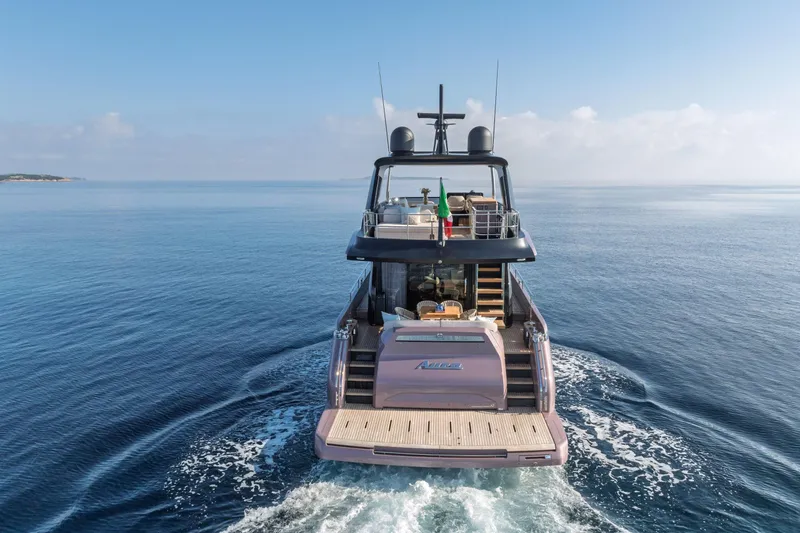 Slide: The Image of 2026 Cranchi Sessantadue 62 yacht cruising on calm blue waters. - 32