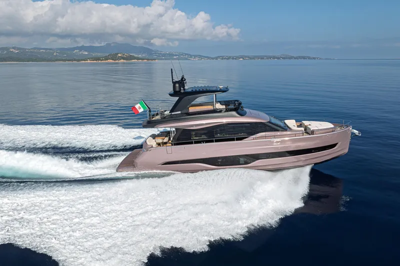 Slide: The Image of 2026 Cranchi Sessantadue 62 yacht cruising on calm blue waters. - 36