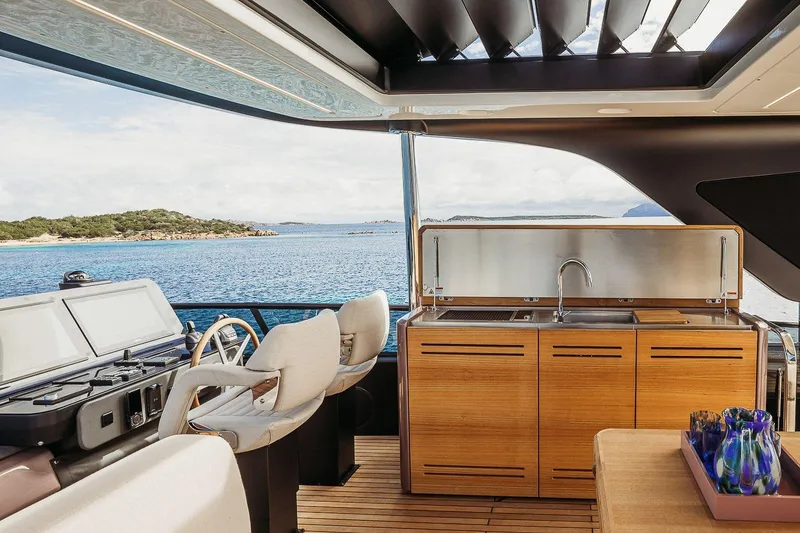 Slide: The Image of Luxurious 2026 Cranchi Sessantadue 62 yacht interior with modern kitchen and ocean view. - 38