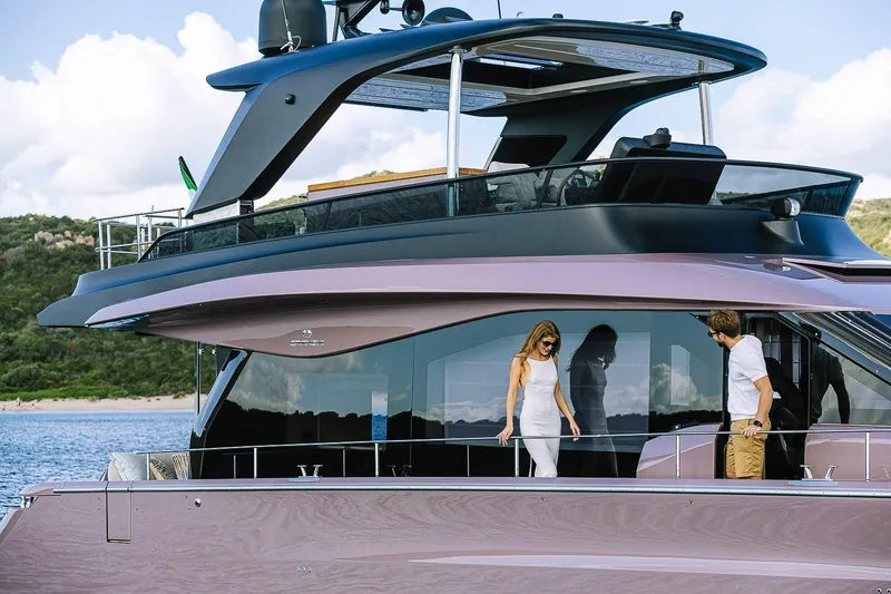 Slide: The Image of 2026 Cranchi Sessantadue 62 yacht with people on deck, scenic background. - 41