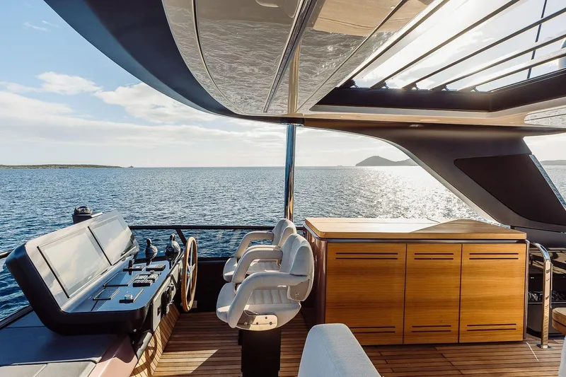 Slide: The Image of Luxurious 2026 Cranchi Sessantadue 62 yacht interior with ocean view and modern helm. - 42
