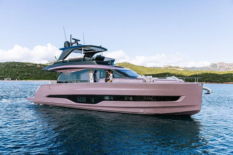 Slide: The Image of 2026 Cranchi Sessantadue 62 yacht cruising on serene blue waters. - 45