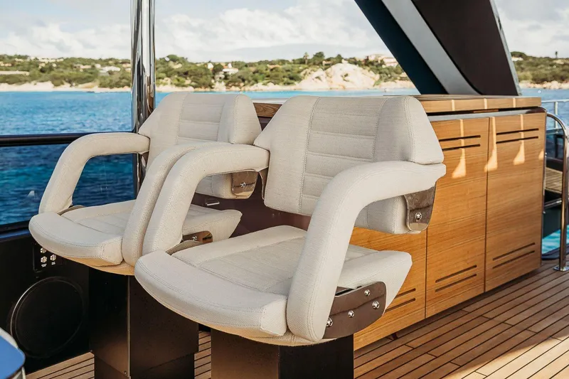 Slide: The Image of Luxury seating on 2026 Cranchi Sessantadue 62 yacht with ocean view. - 48