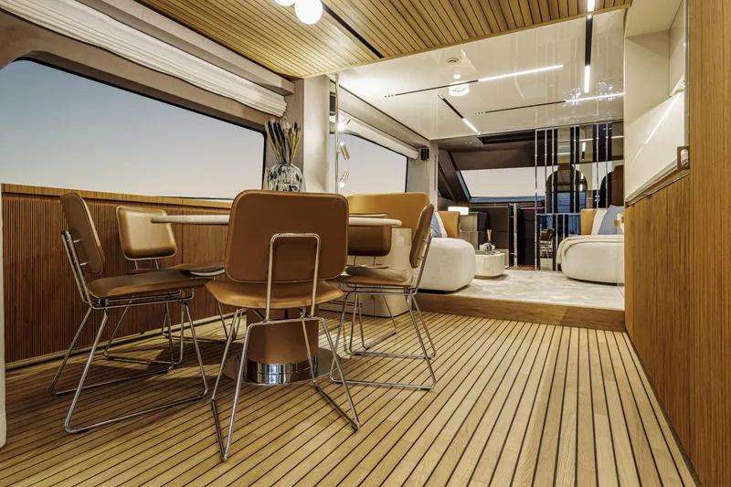 Slide: The Image of Luxurious interior of 2026 Cranchi Sessantadue 62 yacht with modern dining area. - 8