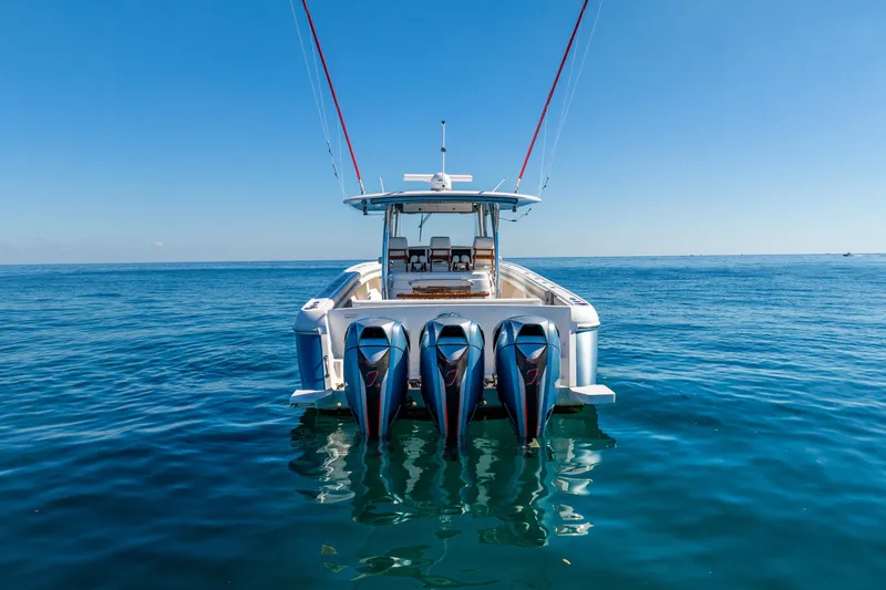 Slide: The Image of 2015 Intrepid 475 Panacea boat with triple engines on open sea. - 1