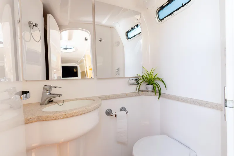 Slide: The Image of Luxurious bathroom interior of 2015 Intrepid 475 Panacea yacht with modern fixtures. - 19