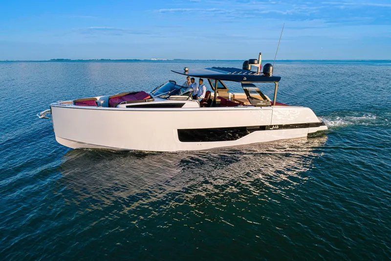 The Image of 2026 Cranchi A46 Luxury Tender cruising on open water under clear skies. - 1