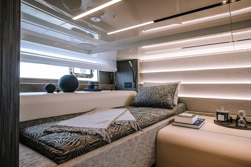 Slide: The Image of Luxurious interior of 2026 Cranchi A46 Luxury Tender with elegant bedding and modern decor. - 10