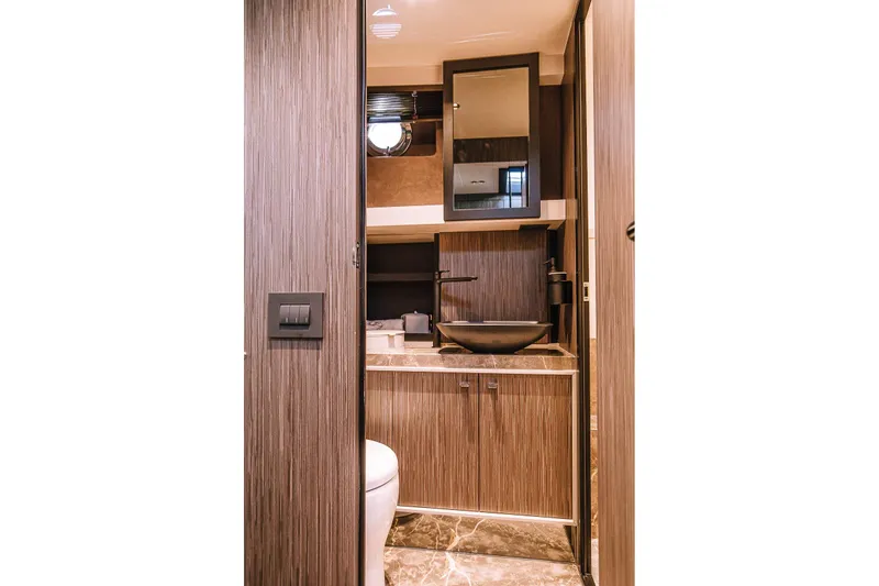Slide: The Image of Luxurious bathroom interior of 2026 Cranchi A46 Luxury Tender yacht, featuring modern fixtures and elegant design. - 11