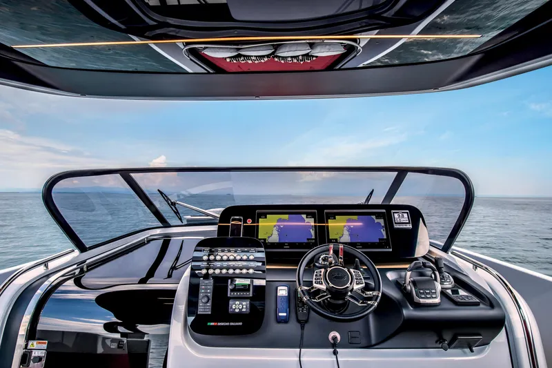 Slide: The Image of Cockpit view of 2026 Cranchi A46 Luxury Tender with advanced navigation systems. - 15