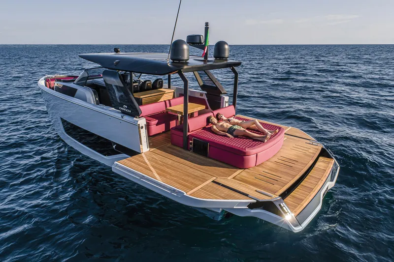 Slide: The Image of 2026 Cranchi A46 Luxury Tender yacht with sunbathing area on open sea. - 18