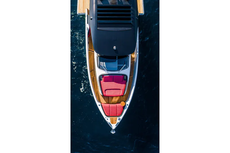Slide: The Image of Aerial view of 2026 Cranchi A46 Luxury Tender with red seating and sleek design. - 33