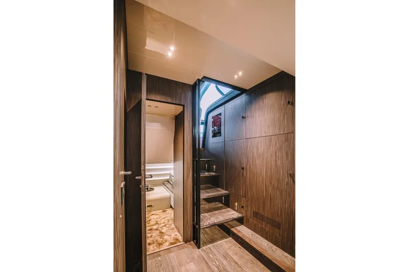 Slide: The Image of Luxurious interior of 2026 Cranchi A46 Luxury Tender with modern wood finishes and elegant design. - 9