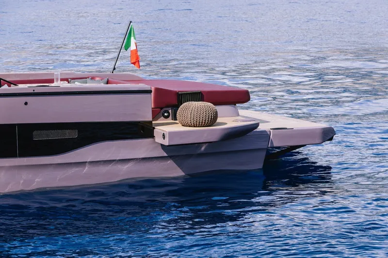 Slide: The Image of 2026 Cranchi A32 Luxury Tender on water with Italian flag. - 17