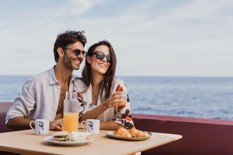 Slide: The Image of Couple enjoying breakfast on Cranchi A32 Luxury Tender, 2026, with ocean view. - 30