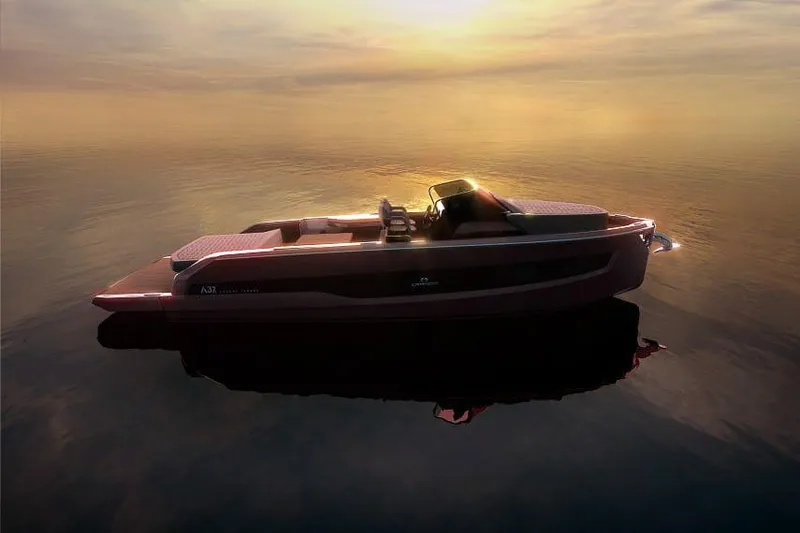 Slide: The Image of 2026 Cranchi A32 Luxury Tender at sunset on calm waters. - 44