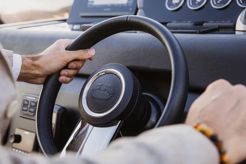 Slide: The Image of Steering wheel of 2026 Cranchi A32 Luxury Tender, close-up view. - 9