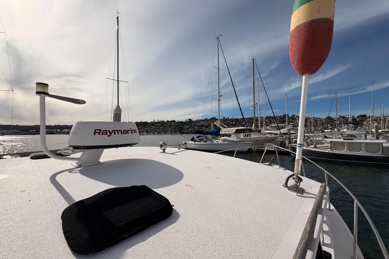 Slide: The Image of 2002 Eastern Downeast 35 boat with Raymarine equipment docked in a marina. - 15