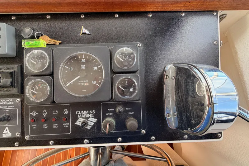 Slide: The Image of Control panel of a 2002 Eastern Downeast 35 boat with Cummins Marine gauges. - 36