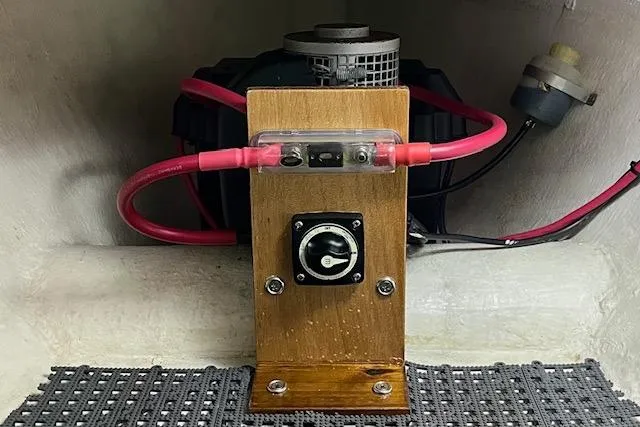 Slide: The Image of Electrical setup inside a 2002 Eastern Downeast 35 boat, featuring wiring and components. - 67