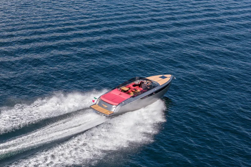 Slide: The Image of 2026 Cranchi E26 Classic speedboat cruising on open water. - 40