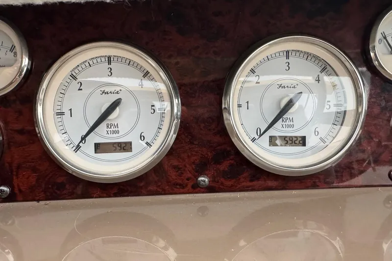 Slide: The Image of Close-up of 2006 Regal Commodore 3560 IO tachometers displaying RPM readings. - 7