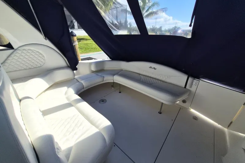 Slide: The Image of Luxurious interior of 2004 Sea Ray 380 Sundancer with plush seating and elegant design. - 4