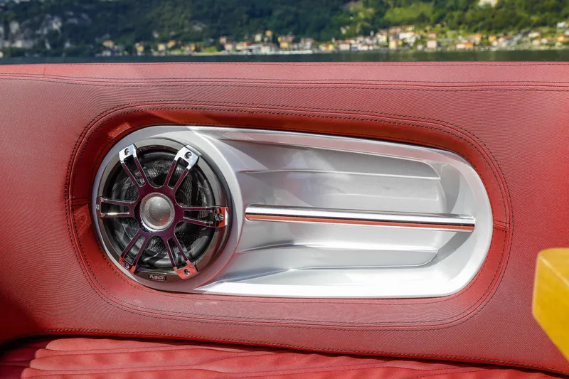 Slide: The Image of Red interior speaker detail on 2026 Cranchi E26 Rider boat. - 31