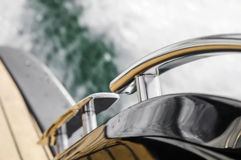 Slide: The Image of Close-up of 2026 Cranchi E26 Rider's sleek chrome railing detail. - 44