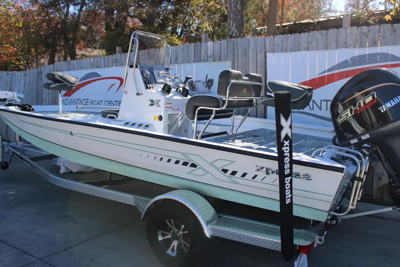 Slide: The Image of 2026 Xpress H20B Bay boat on trailer at Advantage Boat Center. - 3