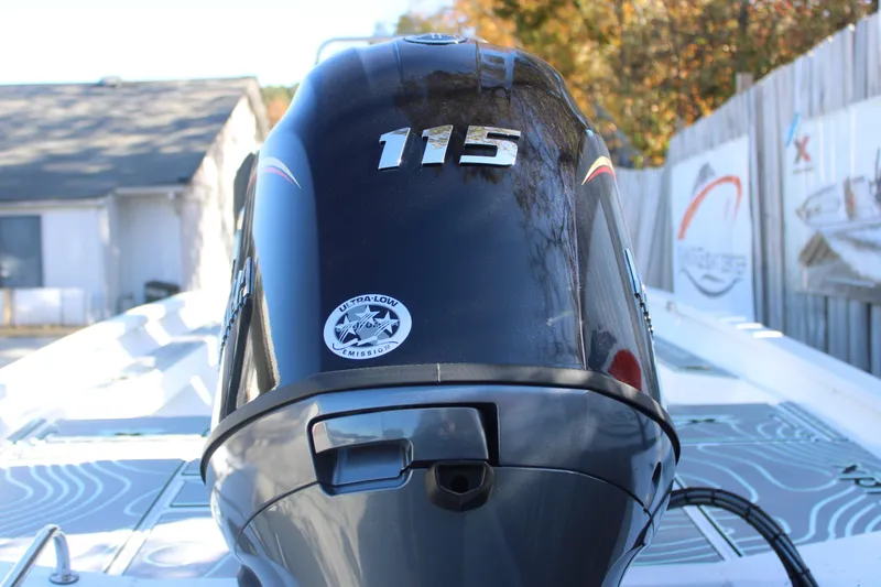 Slide: The Image of 2026 Xpress H20B Bay boat with 115 horsepower engine, featuring ultra-low emission technology. - 5