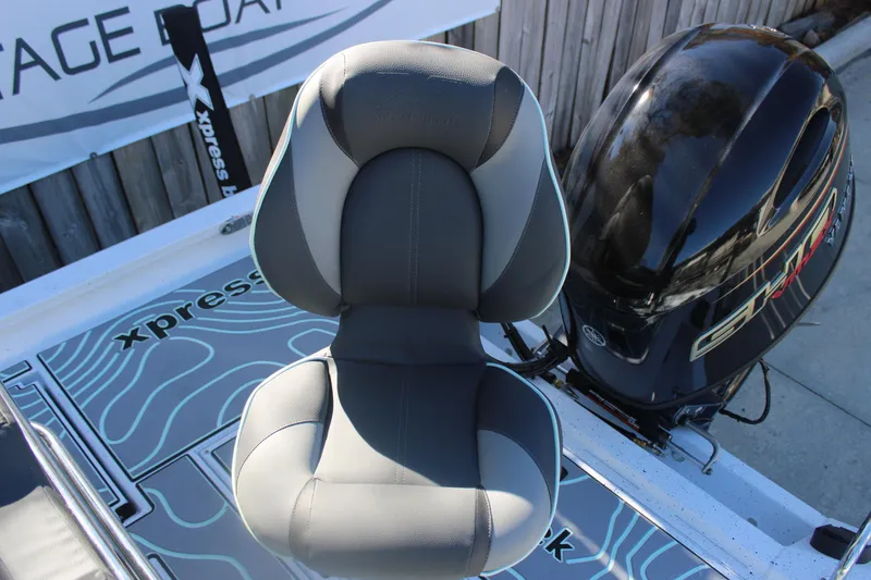 Slide: The Image of 2026 Xpress H20B Bay boat seat and engine detail. - 7