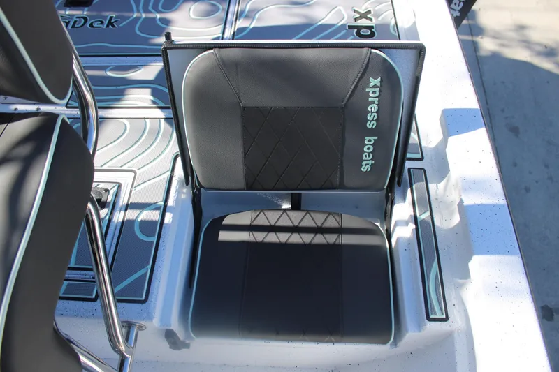 Slide: The Image of 2026 Xpress H20B Bay boat seat with stylish design and branding. - 9