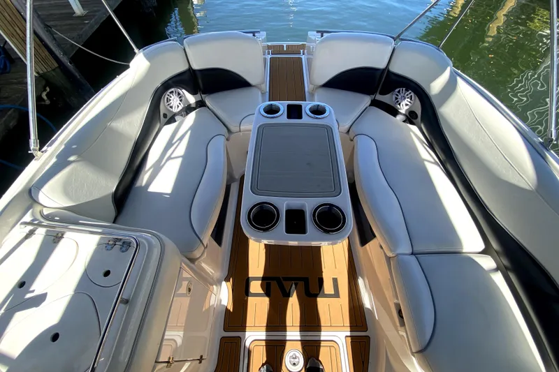 Slide: The Image of Interior of 2006 Monterey 263 Explorer Sport boat with seating and table. - 19