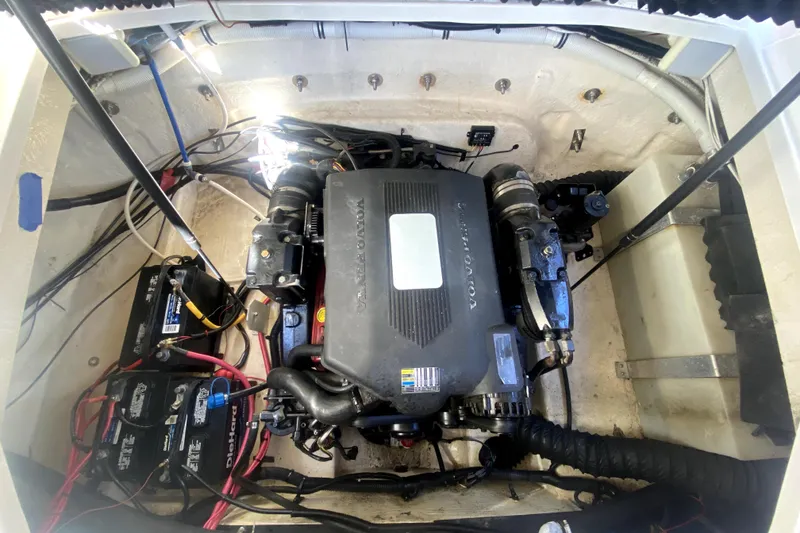 Slide: The Image of Engine compartment of a 2006 Monterey 263 Explorer Sport boat, featuring a Volvo Penta engine. - 41