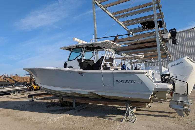 The Image of 2024 Blackfin 332 CC boat on dry dock with Mercury engines. - 0