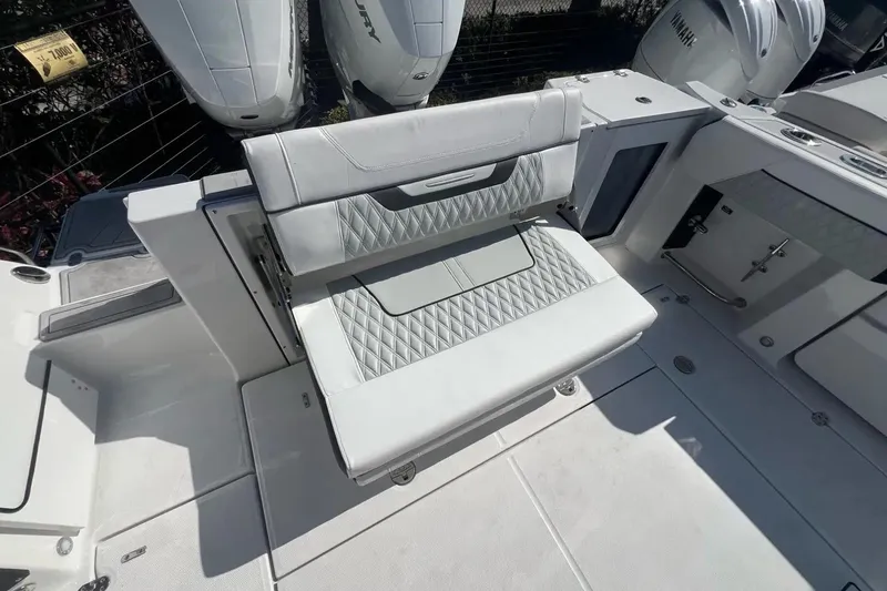 Slide: The Image of 2024 Blackfin 332 CC boat interior with luxurious seating and modern design. - 29