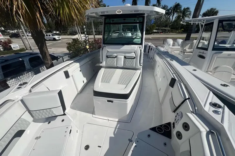 Slide: The Image of 2024 Blackfin 332 CC boat interior with luxurious seating and modern design. - 35